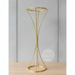 Load image into Gallery viewer, Gold metal vase on a wooden surface with a gray background
