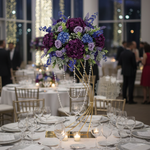 Load image into Gallery viewer, Decorative floral arrangement on a table with candles and glasses in a festive indoor setting.
