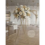 Load image into Gallery viewer, Decorative floral arrangement on a stand in a stylish room with chairs and tables.
