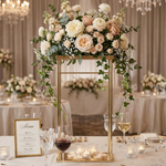 Load image into Gallery viewer, Decorative floral arrangement on a stand with candles and glasses in a formal setting.

