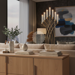 Load image into Gallery viewer, Modern living room with a wooden console table, decorative items, and a large abstract painting.
