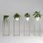Load image into Gallery viewer, Four potted plants on gold stands against a gray background.

Flower Stand, Wedding Centerpiece, Geometric Stand, Pedestal Stand, Floral Riser. Gold Metal Stand, Heavy Duty, Modern Wedding Decor, Event Centerpiece, Aisle Pedestal, Collapsible Stand.

