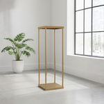 Load image into Gallery viewer, Gold metal plant stand with a white pot of green plant against a light gray wall.

Harlow flower stand, gold wedding centerpiece stand, geometric floral riser, metal column vase, Tall centerpiece stand, wedding table decorations, heavy duty flower stand, gold pedestal stand.
