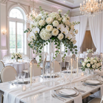 Load image into Gallery viewer, Elegant wedding reception setup with floral centerpieces and table settings.
