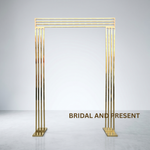Load image into Gallery viewer, Gold decorative arch on a gray background with 'Bridal and Present' text.
