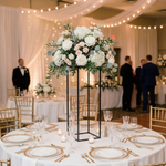 Load image into Gallery viewer, Decorative floral arrangement on a table with formal setting in a banquet hall.

