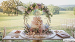 Load and play video in Gallery viewer, Luxury Gold Double Hoop Cake Stand &amp; Floral Arch – 24" or 32" Metal Round Centerpiece for Weddings and Events
