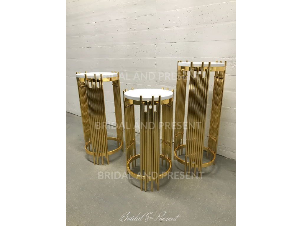 Gold round cylinder pedestal stands for baby shower, bridal shower, birthday parties, events, and parties. Inspired by wedding centerpiece ideas, DIY wedding centerpieces for round tables by using our tall gold centerpieces, flower column stands and boho wedding centerpieces.