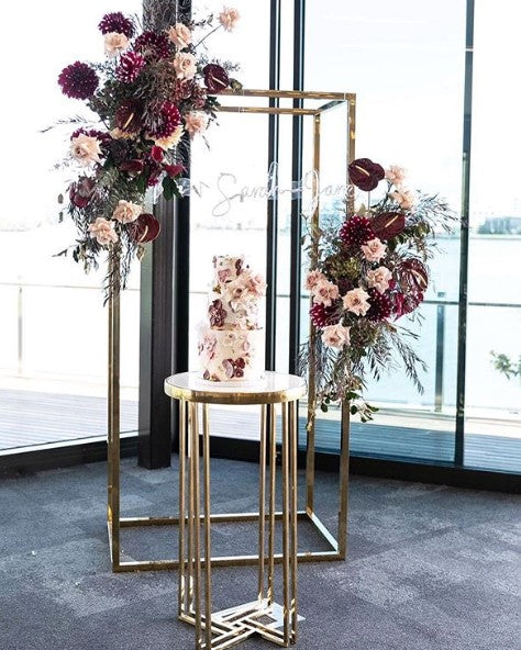 Wedding arch is a sturdy backdrop stand for beautiful wedding background. It's a collapsible backdrop stand that pairs with wedding altar flower arches.
